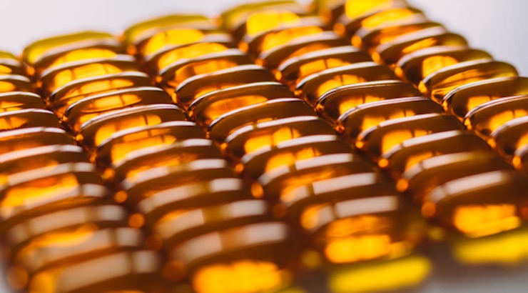 Supplements-in-a-row-pill-capsules.jpg