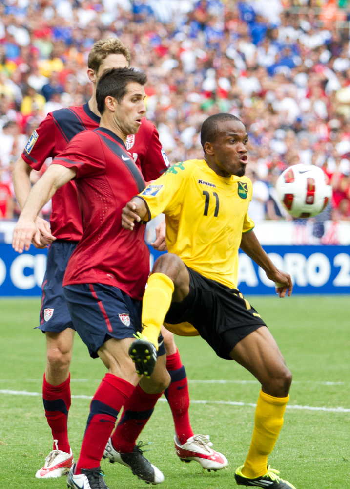 Soccer NEws: une 19: Carlso Bocanegra (left) and Dane Richards (11) position themselves for the ball during the US vs Jamaica CONCACAF Gold Cup on June 19, 2011 in Washington, DC