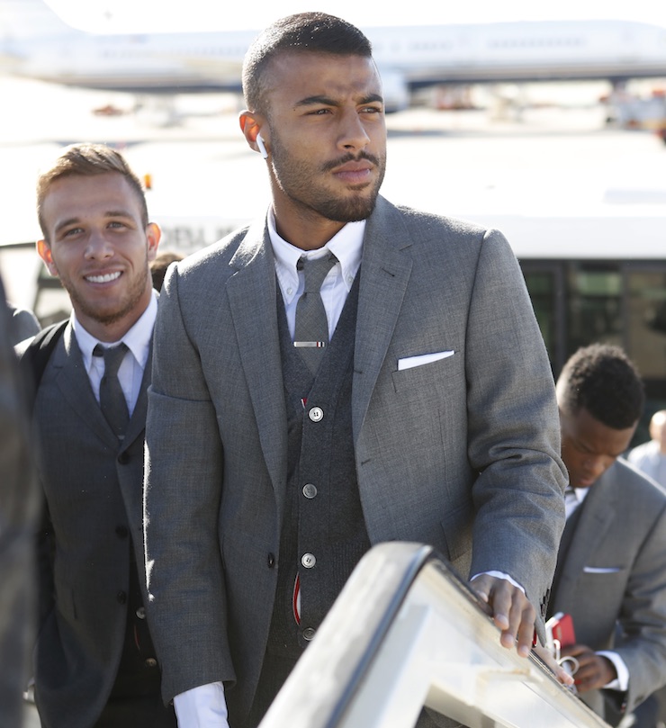 THOM BROWNE OFFICIAL OFF-FIELD TEAM UNIFORMS The team wears the suits from the American designer to travel to London for the Champions League match