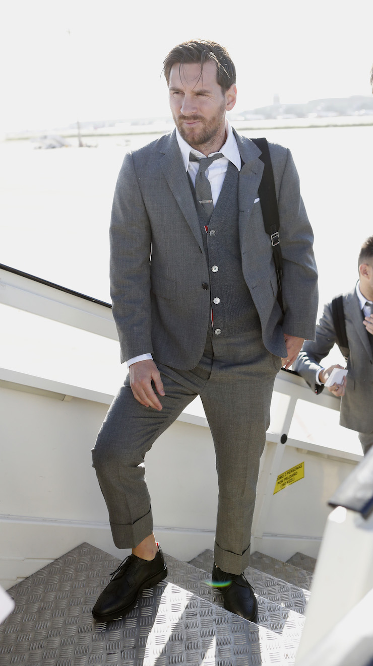 FC BARCELONA wears the suits from the American designer to travel to London for the Champions League match