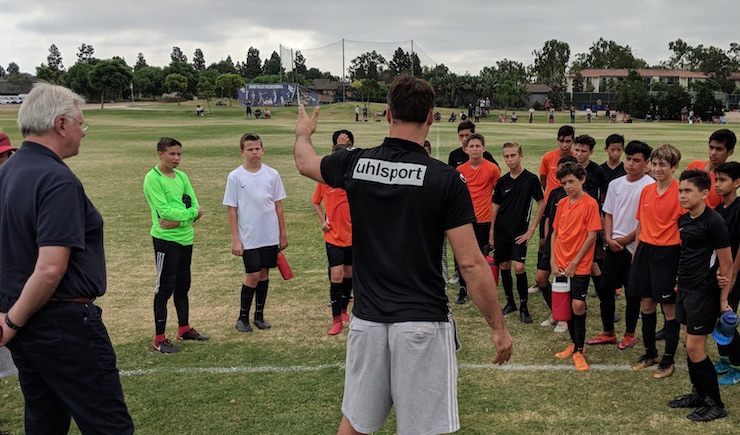 Youth soccer news: Robert Palikuca, Manager of Fortuna Dusseldorf, and Heiko Flottman, Head Scout of Werder Bremen address a a group of Southern California boys at a recent Talentprojekt ID Camp