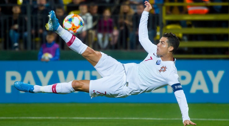 Cristiano-Ronaldo-of-Portugal-controls-the-ball-during-the-2020-UEFA-European-Championships-qualifying-match-between-Lithuania-and-Portugal-at-LFF-Arena.jpg