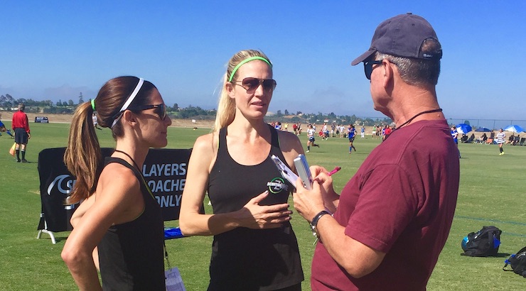 Tara-Parker-and-Brooke-Kentera-of-SCOUTINGZONE-talking-to-college-coaches-at-a-youth-soccer-tournament.jpg