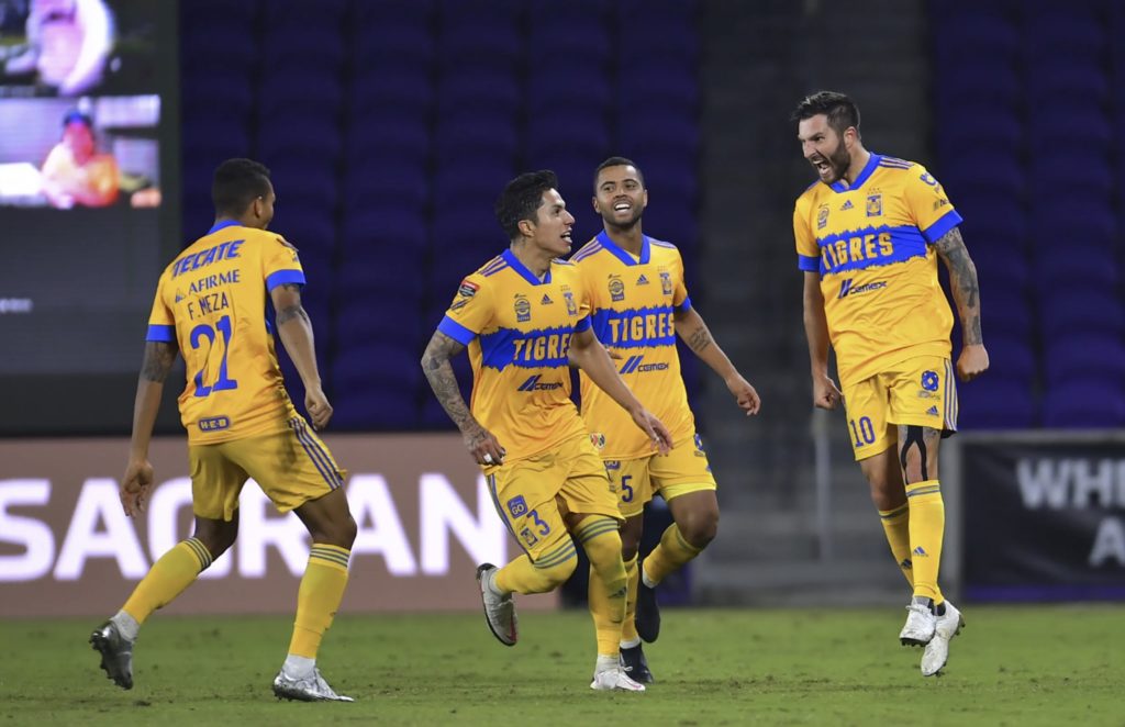 Andre-Pierre-Gignac-celebrates-with-his-teammates-after-scoring-the-winning-goal-for-Tigres-UANL-in-the-Scotiabank-Concacaf-Champions-League-Final-against-LAFC-1024x662.jpg